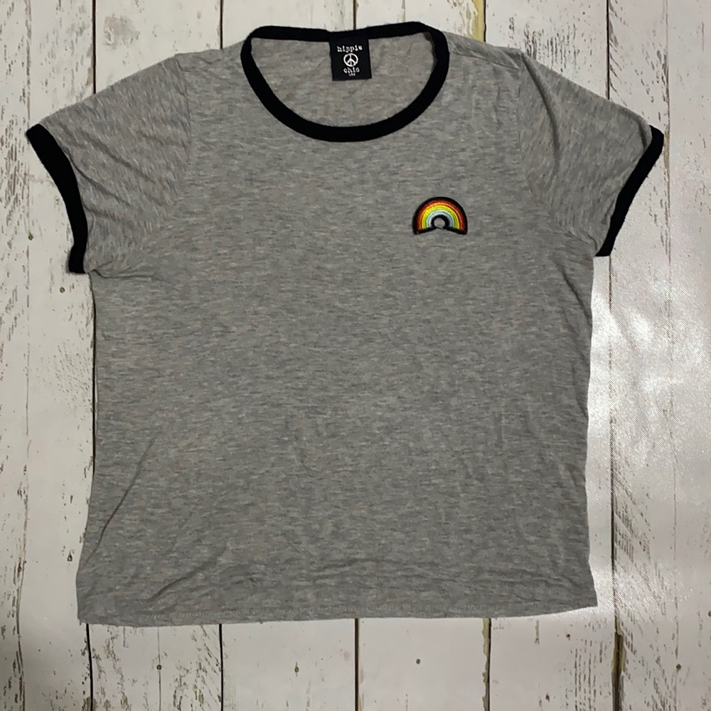 Gray shirt with a rainbow.